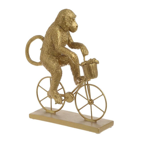 Gold Monkey On Bicycle