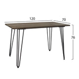 Black mat table with metal legs and wooden top .