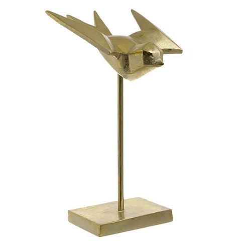 Gold bird on a stand